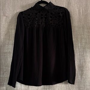 Vintage style high neck lace blouse w/ sexy crochet lace detail.
